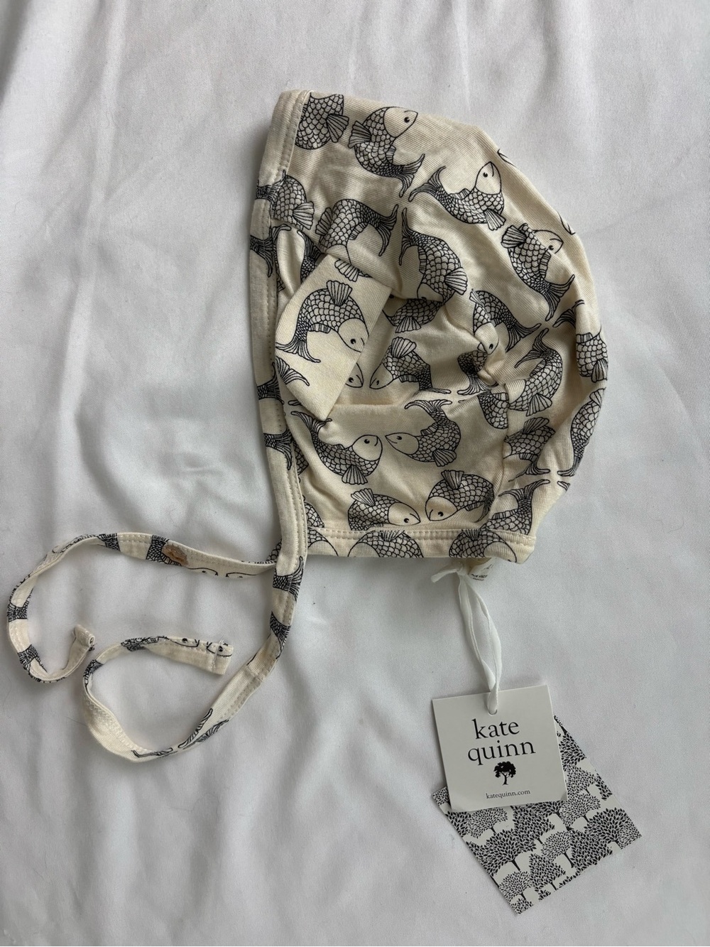 kate quinn Cream Baby Bonnet with Black Fish Print